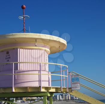 Royalty Free Photo of a Pink Art Deco Lifeguard Tower on a Beach in Miami, Florida, USA