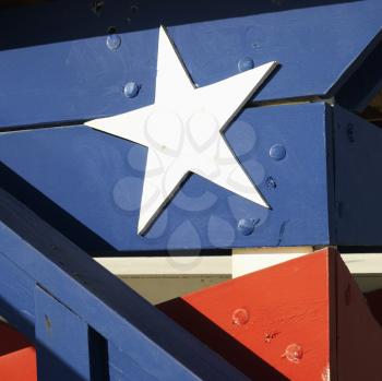Royalty Free Photo of a Close-up of a Lifeguard Tower Painted Red, White and Blue With Stars and Stripes in Miami, Florida, USA