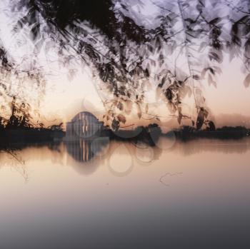 Royalty Free Photo of the Jefferson Memorial Reflected in Water in Washington, D.C., USA