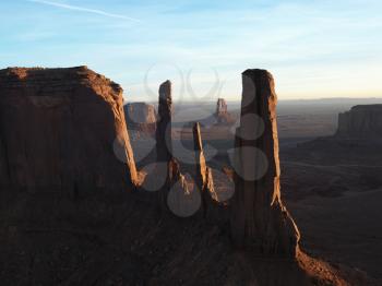 Royalty Free Photo of Three Sisters Rock formations in Monument Valley