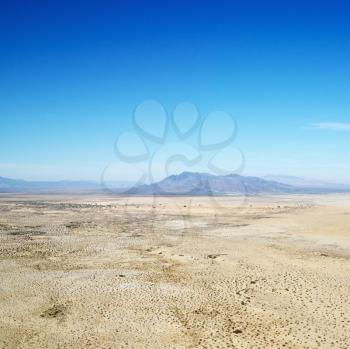 Royalty Free Photo of an Aerial View of Remote California Desert With a Mountain Range in the Background