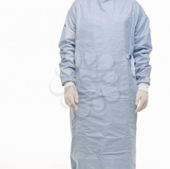 Royalty Free Photo of a Male wearing scrubs and medical latex gloves