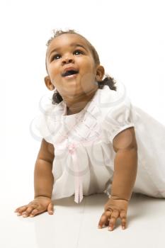 Royalty Free Photo of an Infant Girl Against a White Background