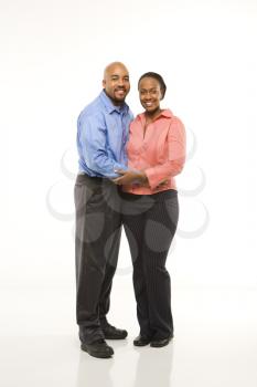 Royalty Free Photo of an African American Couple With Arms Around Each Other 