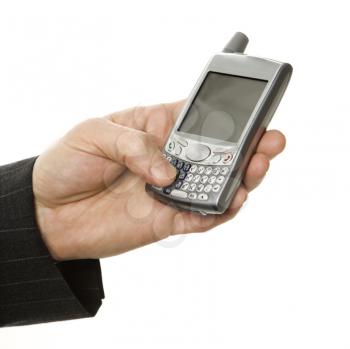 Royalty Free Photo of a Close-up of a Businessman Using a Hand Held PDA