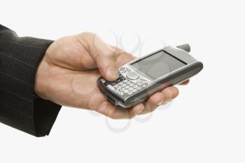 Royalty Free Photo of a Close-up of a Businessman Using a Hand Held PDA