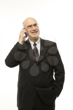 Royalty Free Photo of a Caucasian Businessman Talking on a Cellphone Smiling