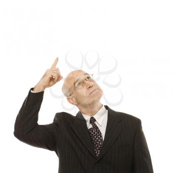 Royalty Free Photo of a Businessman Pointing Up