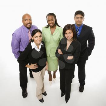 Portrait of multi-ethnic business group standing looking at viewer.