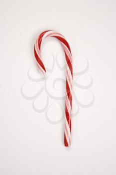 Still life of red and white candy cane.