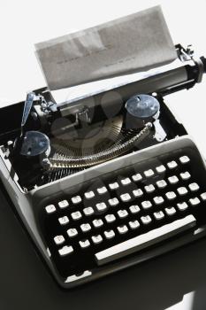 Royalty Free Photo of a Typewriter With Paper