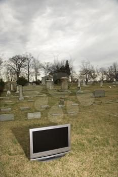 Royalty Free Photo of a Flat Panel Television Set in a Cemetery