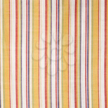Royalty Free Photo of a Close-up of Woven Vintage Fabric With Colorful Stripes on Cotton