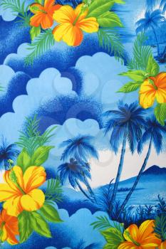 Royalty Free Photo of a Close-Up of Bright Blue Hawaiian Vintage Fabric With Orange Hibiscus Flowers Printed on Polyester