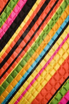 Royalty Free Photo of a Close-up of a Bright Colorful Striped Quilted Vintage Fabric
