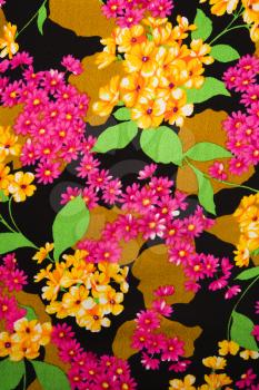 Royalty Free Photo of a Close-up of a Vintage Fabric With Vibrant Flowers