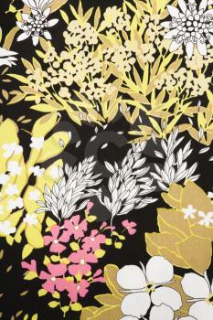 Royalty Free Photo of a Close-up of a Vintage Fabric With Flowers and Leaves on Polyester