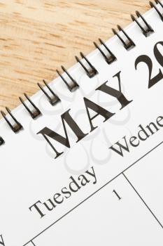Royalty Free Photo of a a Close-up of a Spiral Bound Calendar Displaying the Month of May