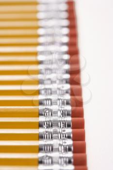 Royalty Free Photo of a Group of Pencils Lined up in an Even Row