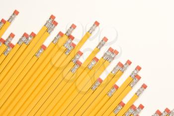 Royalty Free Photo of an Uneven Row of Eraser Ends of Pencils