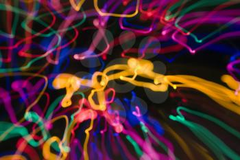 Royalty Free Photo of Multicolored Lights Forming an Abstract Squiggle Pattern From a Motion Blur