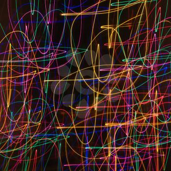 Royalty Free Photo of Multicolored Lights Forming an Abstract Squiggle Pattern From a Motion Blur