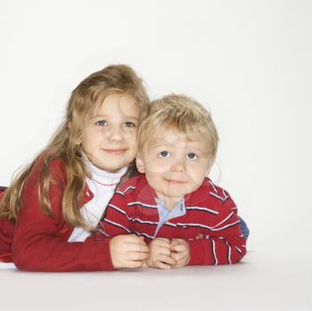 Royalty Free Photo of a Studio Portrait of a Little Boy and Girl