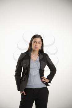 Royalty Free Photo of a Portrait businesswoman standing with hand on hip 
