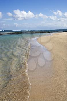 Royalty Free Photo of a Sandy Beach With Waves at Maui, Hawaii