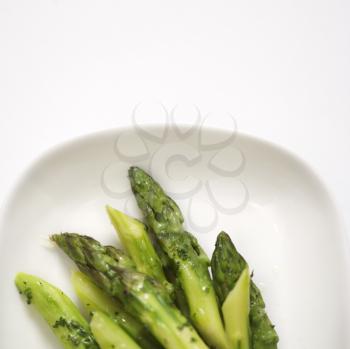 Royalty Free Photo of Plate of Green Cooked Asparagus