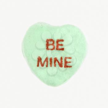 Royalty Free Photo of a Candy Heart That Reads Be Mine