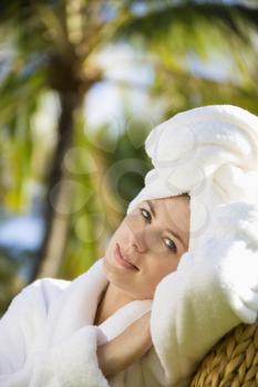 Royalty Free Photo of a Woman Wearing a Bathrobe and Towel