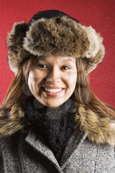 Royalty Free Photo of a Woman Wearing a Fur Hat