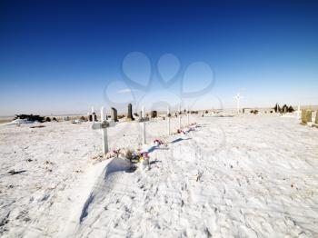 Royalty Free Photo of a Snow Covered Graveyard