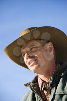 Royalty Free Photo of a Middle-aged Man Wearing a Cowboy Hat