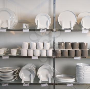 Royalty Free Photo of a Retail Display of Porcelain Dishes and Mugs