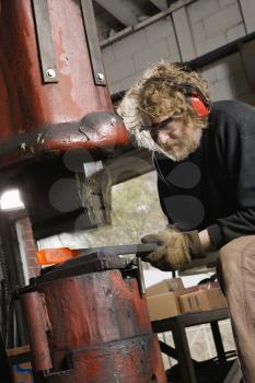 Royalty Free Photo of a Metal Smith 