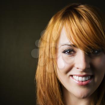 Royalty Free Photo of a Close-Up of a Pretty Young Redheaded Woman