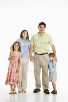 Royalty Free Photo of a Family of Four Standing Holding Hands
