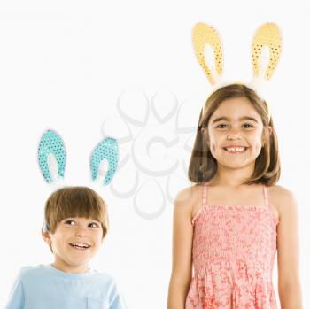 Royalty Free Photo of Two Children Wearing Bunny Ears Smiling