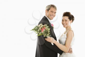 Royalty Free Photo of a Groom and a Bride Embracing