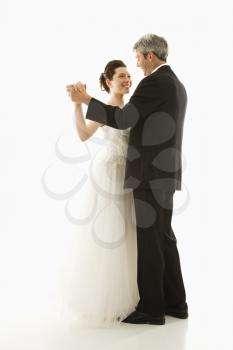 Royalty Free Photo of a Bride and Groom Dancing