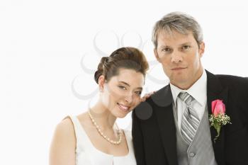 Royalty Free Photo of a Groom and Bride Standing Together