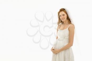 Royalty Free Photo of a Pregnant Bride With Hands on Her Belly