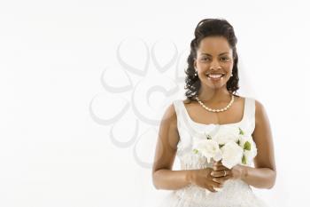 Royalty Free Photo of a Bride Holding A Bouquet