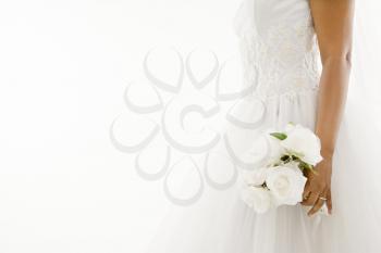 Royalty Free Photo of an African-American Bride Holding Bouquet