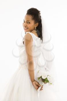 Royalty Free Photo of an African American Bride Holding a Bouquet