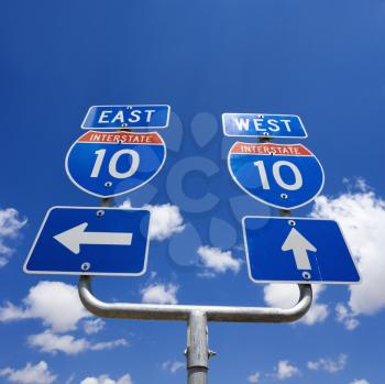 Royalty Free Photo of Highway Interstate 10 Sign With Arrows Pointing East and West