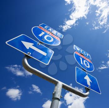 Royalty Free Photo of a Highway Interstate 10 Sign With Arrows Showing Directions