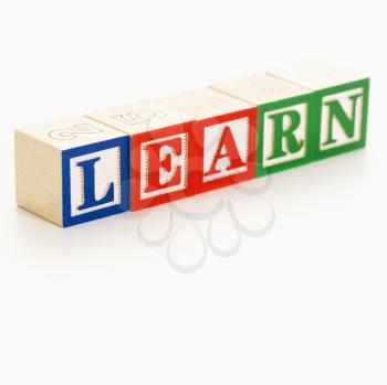 Royalty Free Photo of an Alphabet Toy Building Blocks Spelling the Word Learn.